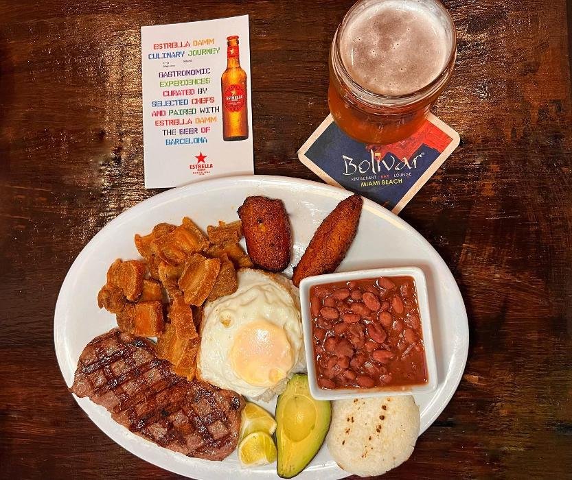 Plated meal with beer on table