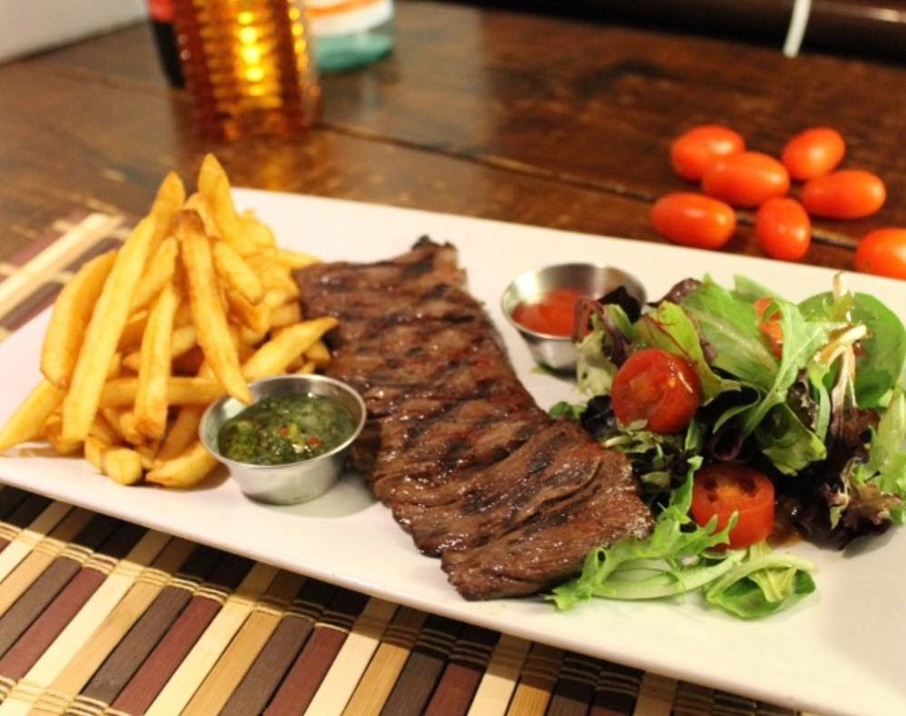 Steak with fries and salad